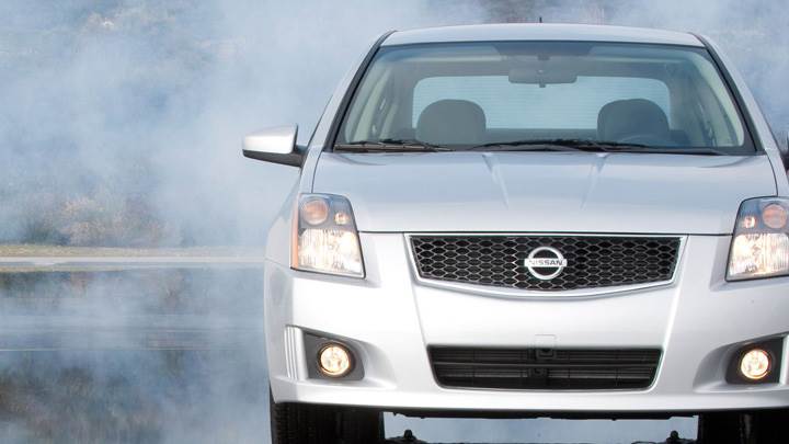 Front Pose Of 2009 Nissan Sentra SR In White